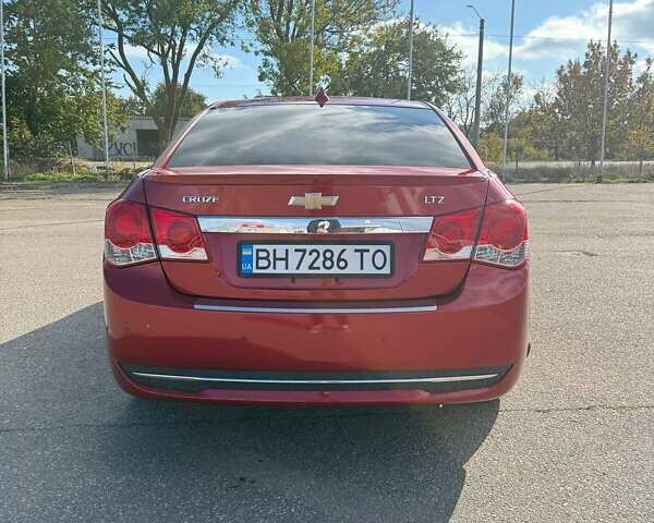 Красный Шевроле Круз, объемом двигателя 1.36 л и пробегом 232 тыс. км за 8300 $, фото 1 на Automoto.ua