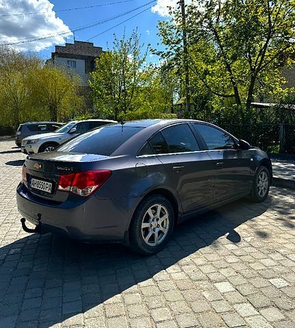 Серый Шевроле Круз, объемом двигателя 2 л и пробегом 255 тыс. км за 6300 $, фото 1 на Automoto.ua