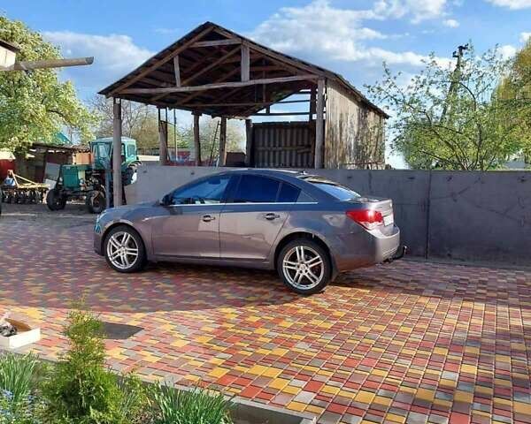 Сірий Шевроле Круз, об'ємом двигуна 2 л та пробігом 245 тис. км за 7250 $, фото 1 на Automoto.ua