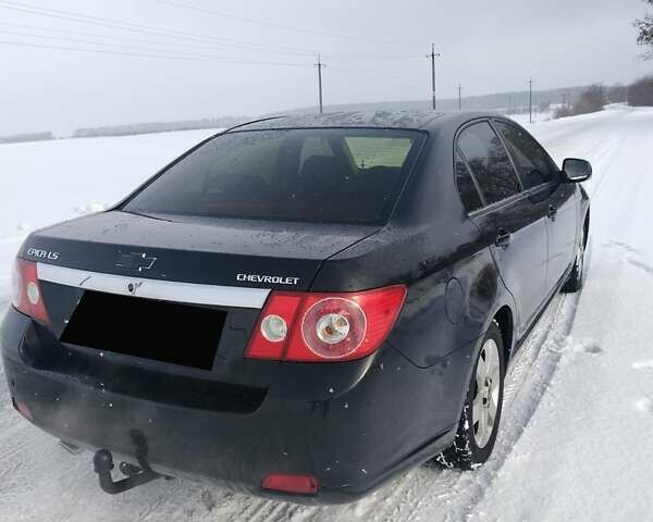Черный Шевроле Эпика, объемом двигателя 1.99 л и пробегом 227 тыс. км за 5500 $, фото 1 на Automoto.ua