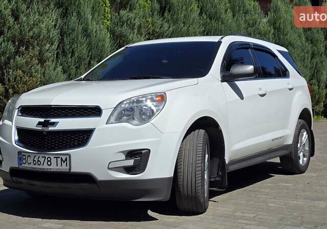 Белый Шевроле Эквинокс, объемом двигателя 2.38 л и пробегом 181 тыс. км за 10299 $, фото 1 на Automoto.ua