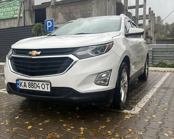Белый Шевроле Эквинокс, объемом двигателя 2 л и пробегом 230 тыс. км за 16000 $, фото 1 на Automoto.ua