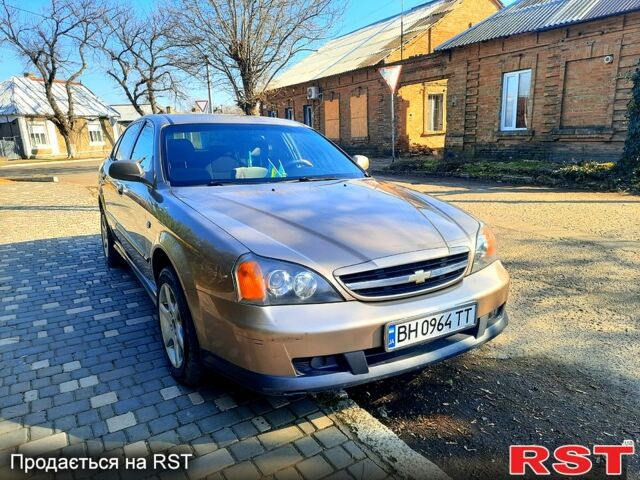 Бежевий Шевроле Еванда, об'ємом двигуна 2 л та пробігом 250 тис. км за 3700 $, фото 1 на Automoto.ua