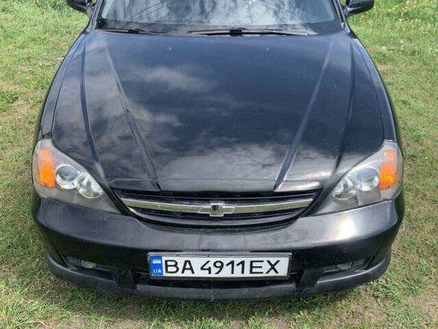 Чорний Шевроле Еванда, об'ємом двигуна 2 л та пробігом 300 тис. км за 2500 $, фото 1 на Automoto.ua