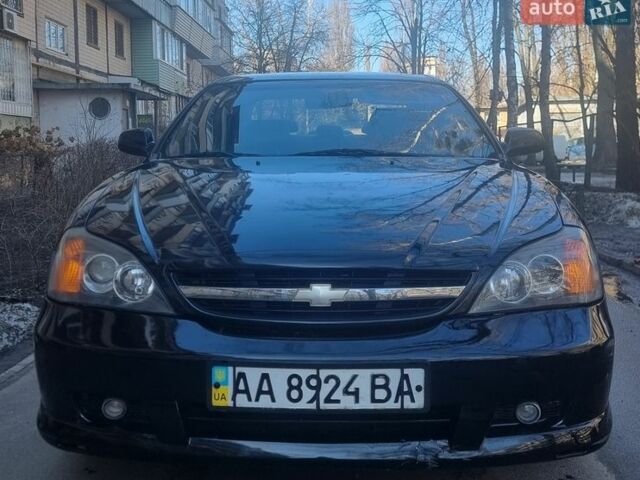 Чорний Шевроле Еванда, об'ємом двигуна 2 л та пробігом 106 тис. км за 3200 $, фото 1 на Automoto.ua