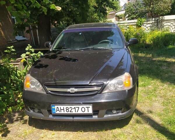 Чорний Шевроле Еванда, об'ємом двигуна 2 л та пробігом 170 тис. км за 4600 $, фото 1 на Automoto.ua