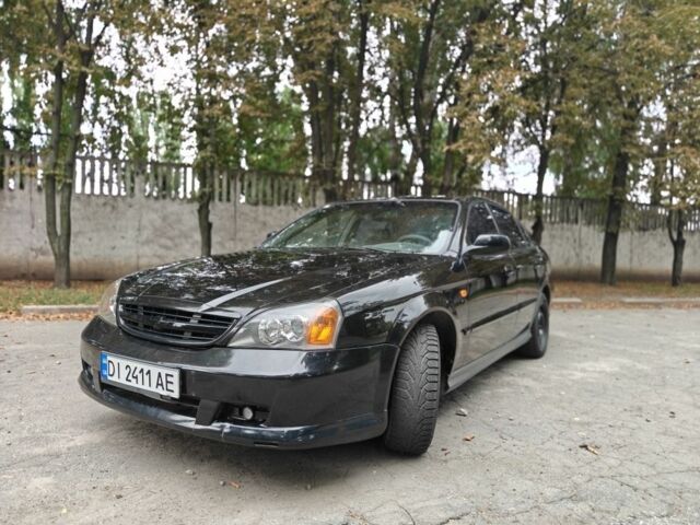 Чорний Шевроле Еванда, об'ємом двигуна 2 л та пробігом 276 тис. км за 4000 $, фото 1 на Automoto.ua