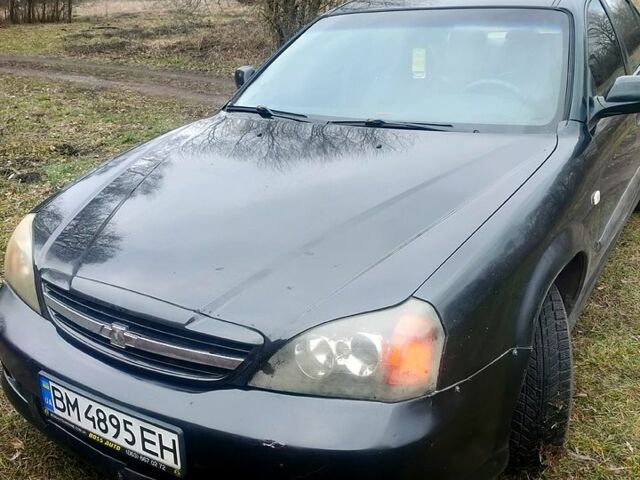 Черный Шевроле Эванда, объемом двигателя 2 л и пробегом 330 тыс. км за 2500 $, фото 1 на Automoto.ua