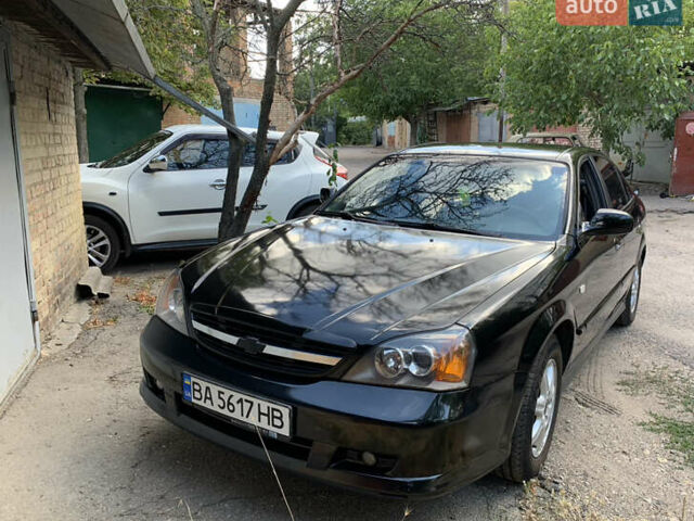Черный Шевроле Эванда, объемом двигателя 2.5 л и пробегом 187 тыс. км за 4700 $, фото 1 на Automoto.ua