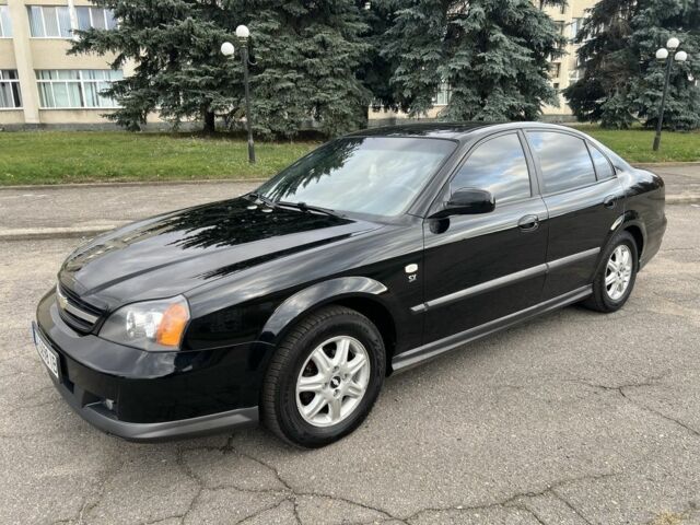 Черный Шевроле Эванда, объемом двигателя 2 л и пробегом 193 тыс. км за 4200 $, фото 1 на Automoto.ua