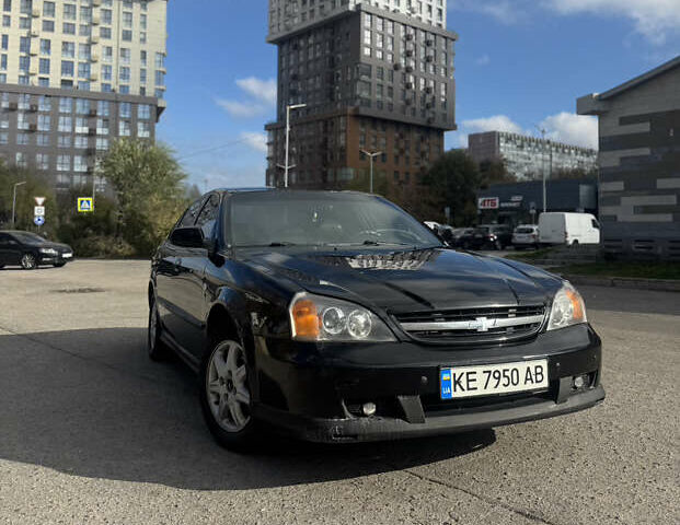 Черный Шевроле Эванда, объемом двигателя 2 л и пробегом 320 тыс. км за 3200 $, фото 1 на Automoto.ua