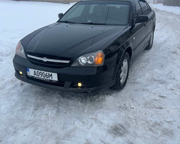Черный Шевроле Эванда, объемом двигателя 2 л и пробегом 92 тыс. км за 6000 $, фото 1 на Automoto.ua