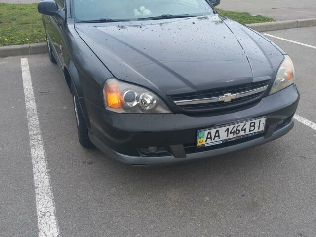 Чорний Шевроле Еванда, об'ємом двигуна 2 л та пробігом 223 тис. км за 3900 $, фото 1 на Automoto.ua