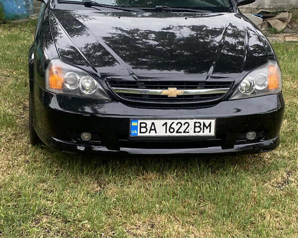 Чорний Шевроле Еванда, об'ємом двигуна 2 л та пробігом 181 тис. км за 5000 $, фото 1 на Automoto.ua