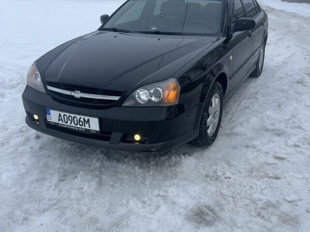Черный Шевроле Эванда, объемом двигателя 2 л и пробегом 92 тыс. км за 6000 $, фото 1 на Automoto.ua