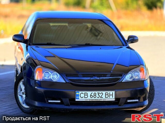 Черный Шевроле Эванда, объемом двигателя 2 л и пробегом 268 тыс. км за 3300 $, фото 1 на Automoto.ua