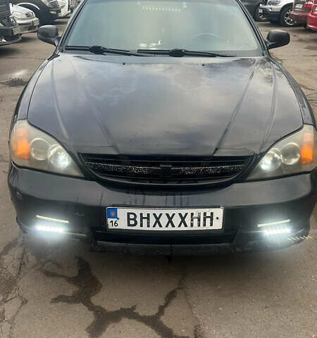 Чорний Шевроле Еванда, об'ємом двигуна 2 л та пробігом 266 тис. км за 3000 $, фото 1 на Automoto.ua