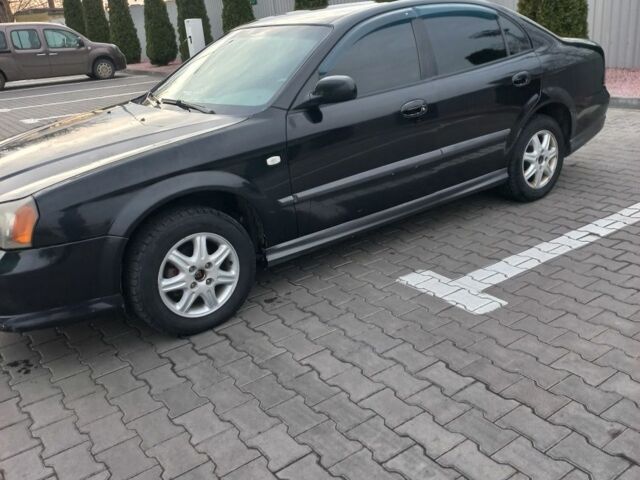 Чорний Шевроле Еванда, об'ємом двигуна 2 л та пробігом 266 тис. км за 2750 $, фото 1 на Automoto.ua