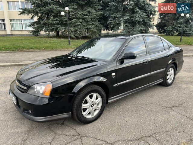 Черный Шевроле Эванда, объемом двигателя 2 л и пробегом 193 тыс. км за 4200 $, фото 1 на Automoto.ua