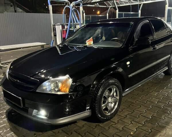 Чорний Шевроле Еванда, об'ємом двигуна 2 л та пробігом 260 тис. км за 5100 $, фото 1 на Automoto.ua