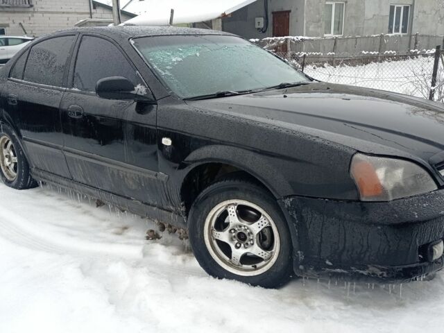 Черный Шевроле Эванда, объемом двигателя 2 л и пробегом 380 тыс. км за 1620 $, фото 1 на Automoto.ua