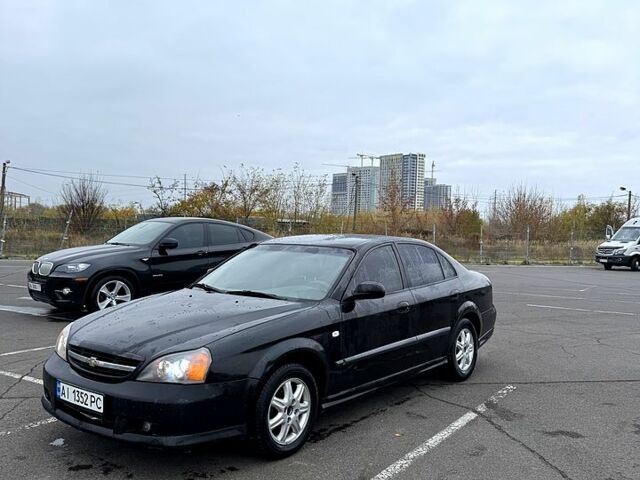 Черный Шевроле Эванда, объемом двигателя 2 л и пробегом 299 тыс. км за 3250 $, фото 1 на Automoto.ua