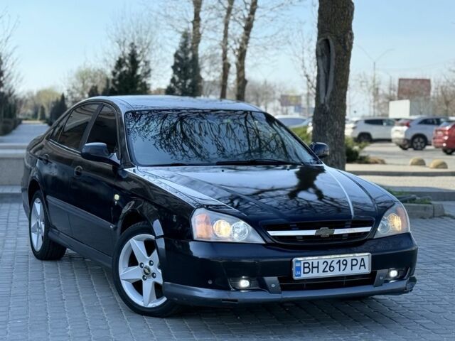 Чорний Шевроле Еванда, об'ємом двигуна 2 л та пробігом 250 тис. км за 3400 $, фото 1 на Automoto.ua