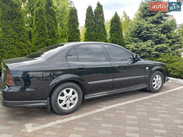 Черный Шевроле Эванда, объемом двигателя 2 л и пробегом 57 тыс. км за 7799 $, фото 1 на Automoto.ua