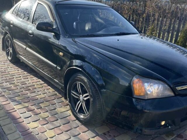 Чорний Шевроле Еванда, об'ємом двигуна 2 л та пробігом 209 тис. км за 2800 $, фото 1 на Automoto.ua