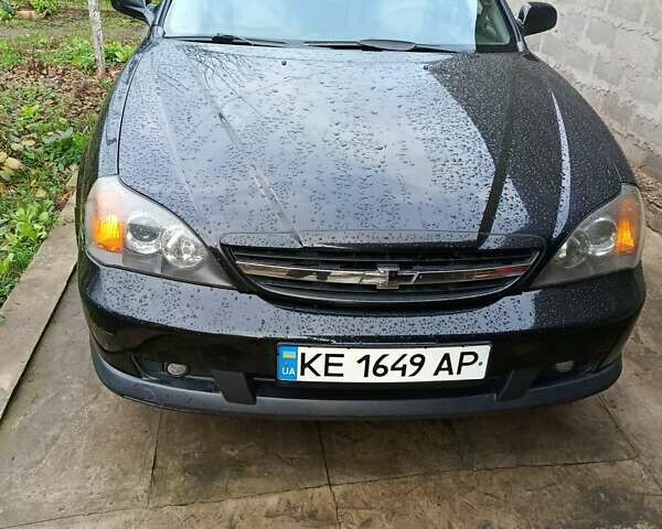 Черный Шевроле Эванда, объемом двигателя 2 л и пробегом 207 тыс. км за 4436 $, фото 1 на Automoto.ua