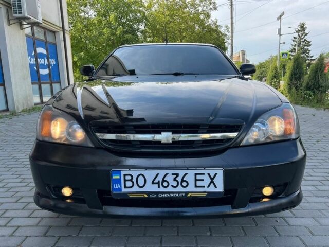 Черный Шевроле Эванда, объемом двигателя 2.5 л и пробегом 150 тыс. км за 3000 $, фото 1 на Automoto.ua