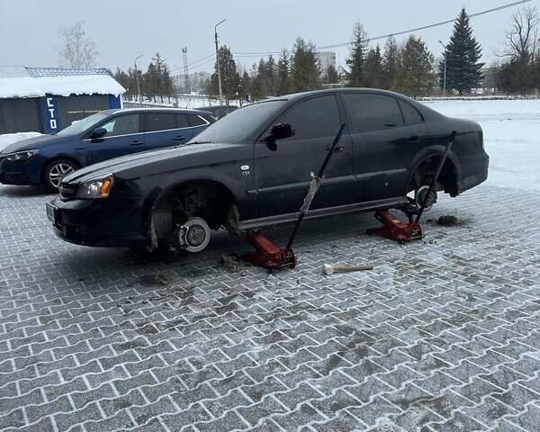 Чорний Шевроле Еванда, об'ємом двигуна 2.5 л та пробігом 190 тис. км за 3600 $, фото 1 на Automoto.ua