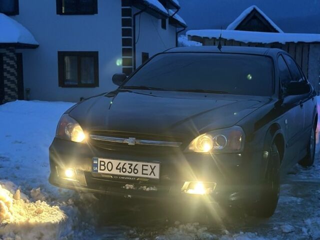 Чорний Шевроле Еванда, об'ємом двигуна 2.5 л та пробігом 190 тис. км за 3600 $, фото 1 на Automoto.ua