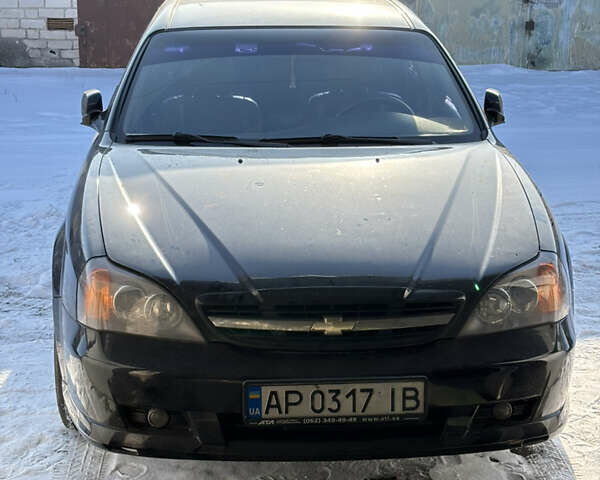 Чорний Шевроле Еванда, об'ємом двигуна 2 л та пробігом 222 тис. км за 4800 $, фото 1 на Automoto.ua