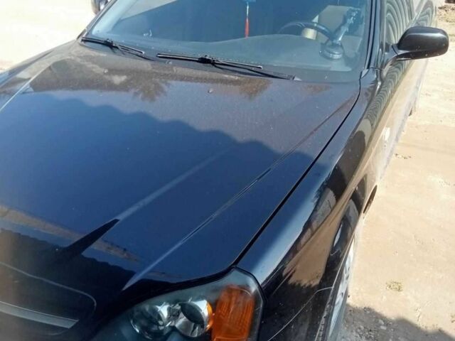 Чорний Шевроле Еванда, об'ємом двигуна 2 л та пробігом 170 тис. км за 4000 $, фото 1 на Automoto.ua