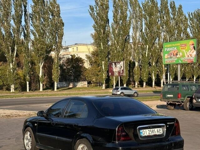 Чорний Шевроле Еванда, об'ємом двигуна 2.5 л та пробігом 210 тис. км за 3000 $, фото 1 на Automoto.ua
