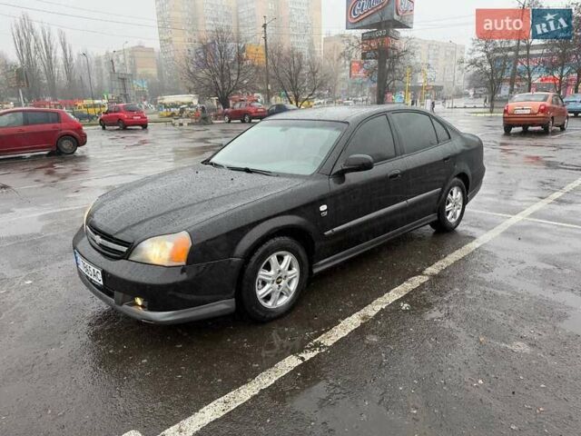 Черный Шевроле Эванда, объемом двигателя 2.49 л и пробегом 256 тыс. км за 3800 $, фото 1 на Automoto.ua