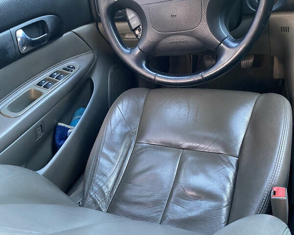 Чорний Шевроле Еванда, об'ємом двигуна 2 л та пробігом 111 тис. км за 4000 $, фото 1 на Automoto.ua