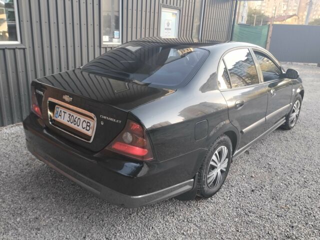 Чорний Шевроле Еванда, об'ємом двигуна 2 л та пробігом 36 тис. км за 3600 $, фото 1 на Automoto.ua