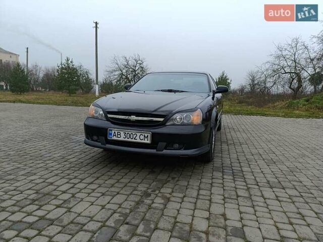 Чорний Шевроле Еванда, об'ємом двигуна 2 л та пробігом 178 тис. км за 5100 $, фото 1 на Automoto.ua