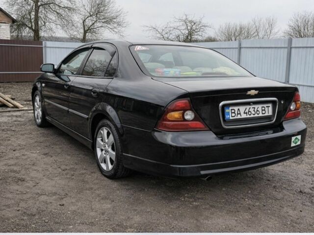 Чорний Шевроле Еванда, об'ємом двигуна 2 л та пробігом 214 тис. км за 3000 $, фото 1 на Automoto.ua