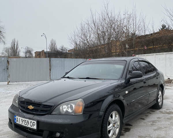 Черный Шевроле Эванда, объемом двигателя 2 л и пробегом 250 тыс. км за 2750 $, фото 1 на Automoto.ua