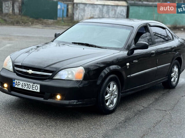 Чорний Шевроле Еванда, об'ємом двигуна 2 л та пробігом 303 тис. км за 2950 $, фото 1 на Automoto.ua