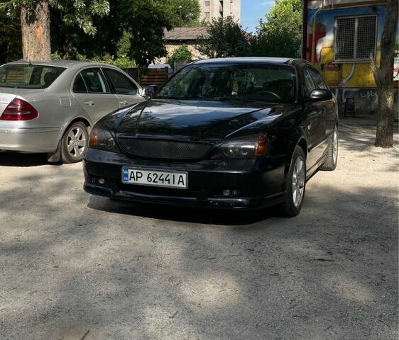 Чорний Шевроле Еванда, об'ємом двигуна 2.5 л та пробігом 280 тис. км за 3600 $, фото 1 на Automoto.ua