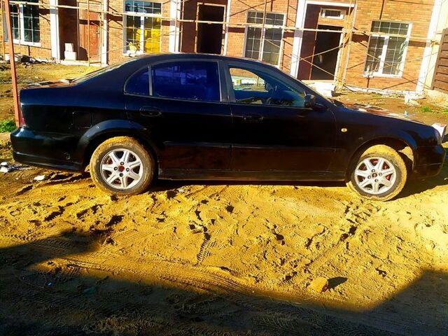 Черный Шевроле Эванда, объемом двигателя 2 л и пробегом 0 тыс. км за 3000 $, фото 1 на Automoto.ua