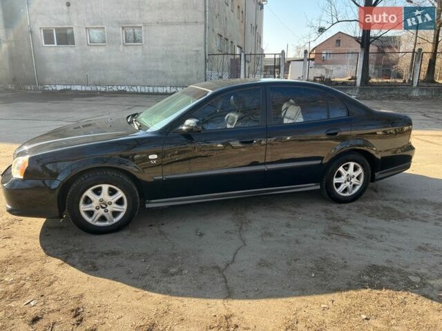 Чорний Шевроле Еванда, об'ємом двигуна 2 л та пробігом 239 тис. км за 3550 $, фото 1 на Automoto.ua