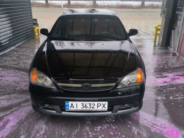 Чорний Шевроле Еванда, об'ємом двигуна 2 л та пробігом 185 тис. км за 3000 $, фото 1 на Automoto.ua
