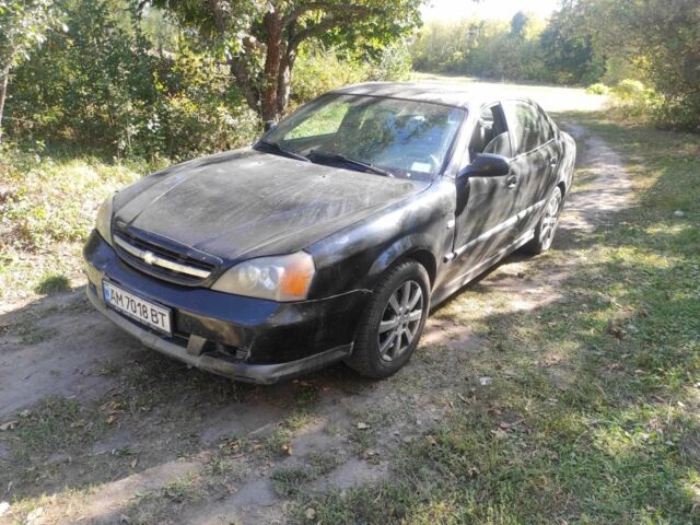 Черный Шевроле Эванда, объемом двигателя 2.5 л и пробегом 250 тыс. км за 2500 $, фото 1 на Automoto.ua