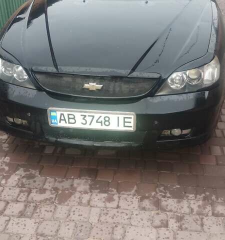 Черный Шевроле Эванда, объемом двигателя 2 л и пробегом 208 тыс. км за 3550 $, фото 1 на Automoto.ua