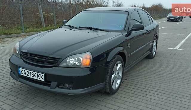 Черный Шевроле Эванда, объемом двигателя 2.49 л и пробегом 298 тыс. км за 3999 $, фото 1 на Automoto.ua